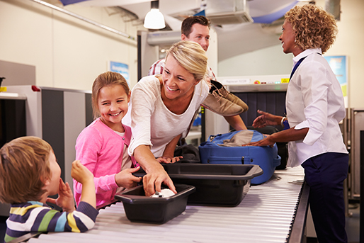 Image - family going through TSA check point